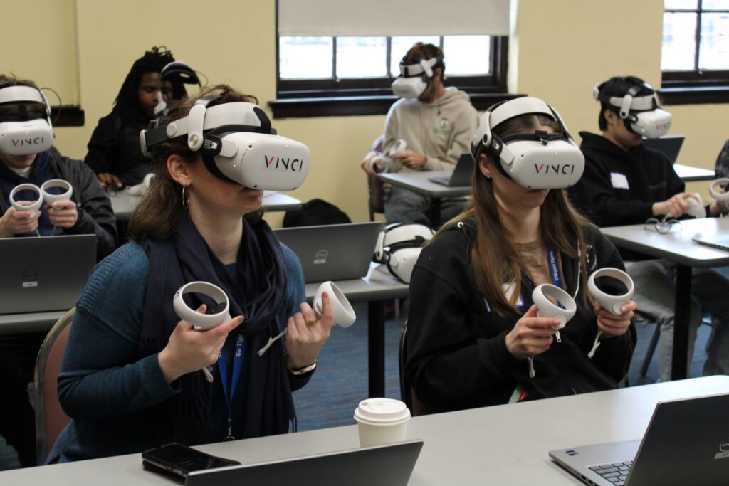 Students climb an offshore wind turbine using VR